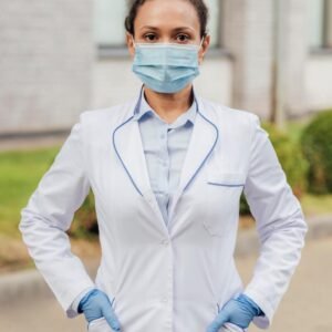 medium shot doctor wearing mask