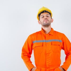 young worker uniform holding hands waist looking confident